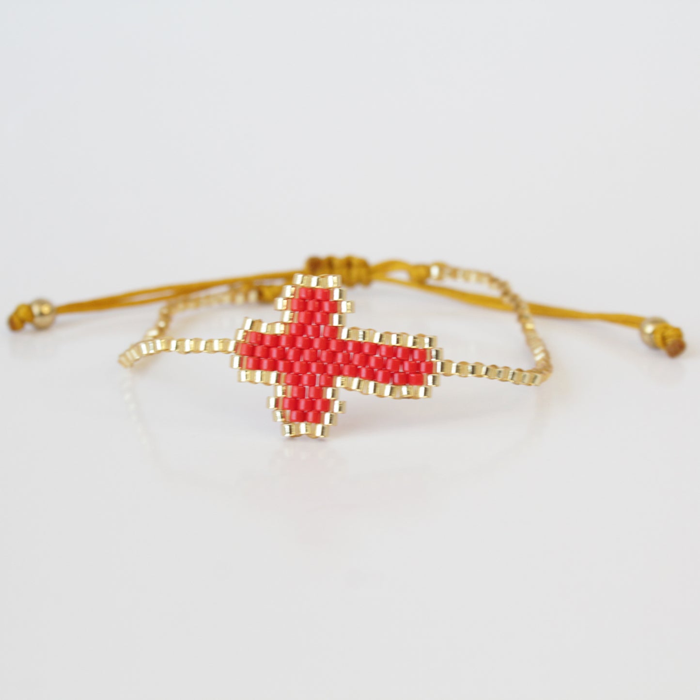 Stylish and Versatile Miyuki Red and Gold Cross Wrap Bracelet