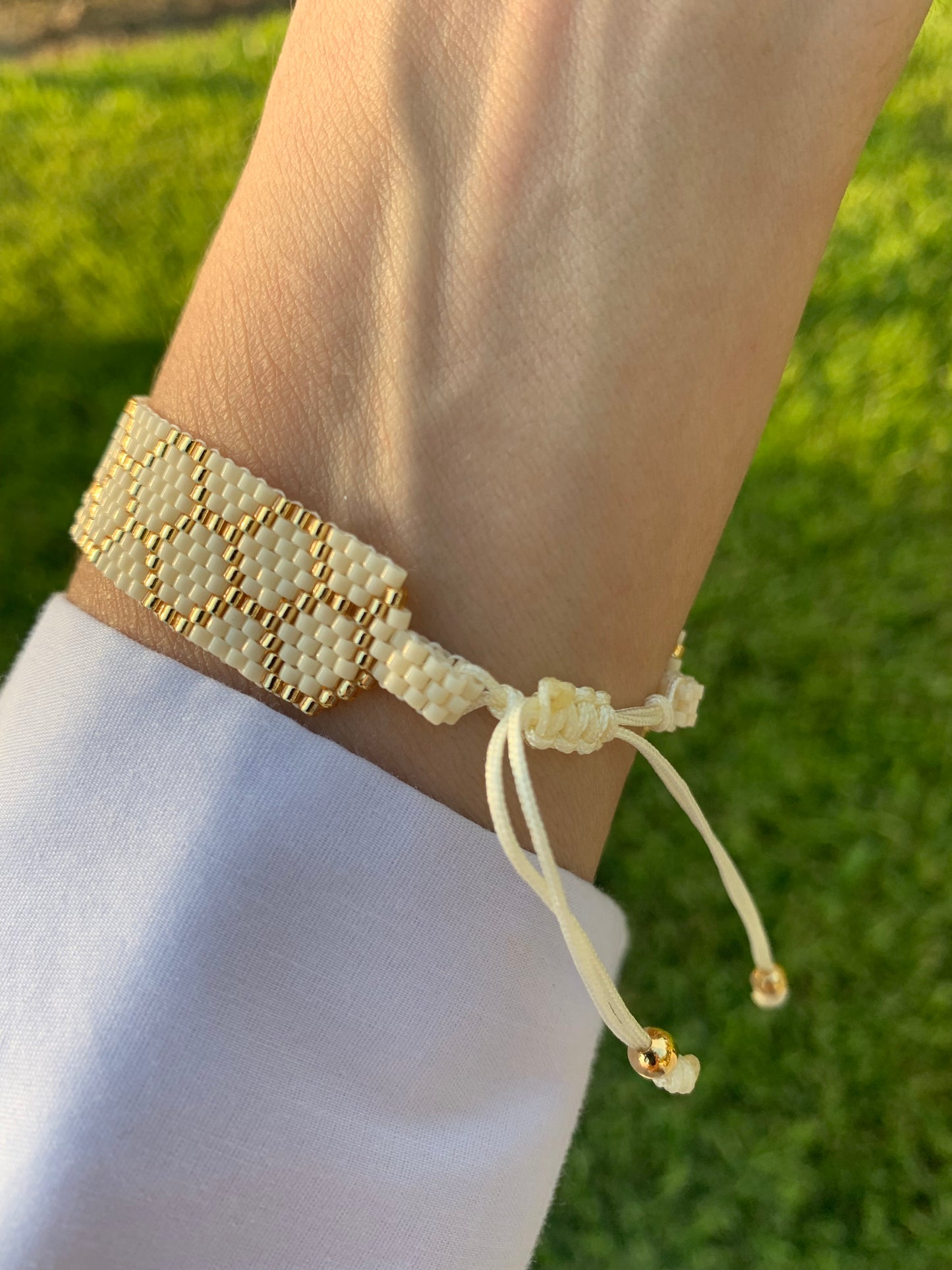 Elegant beige and gold bracelet
