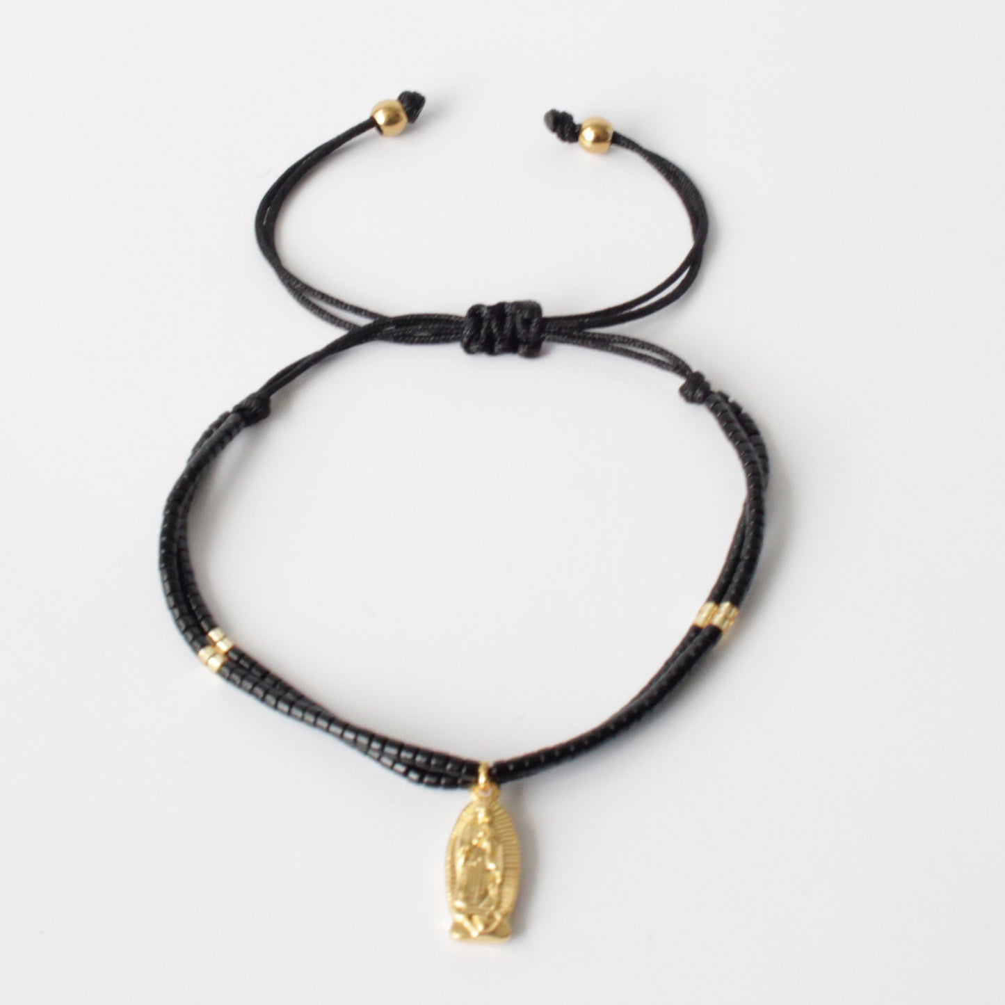 Stylish and Versatile Miyuki Guadalupe Black and Gold Wrap Bracelet