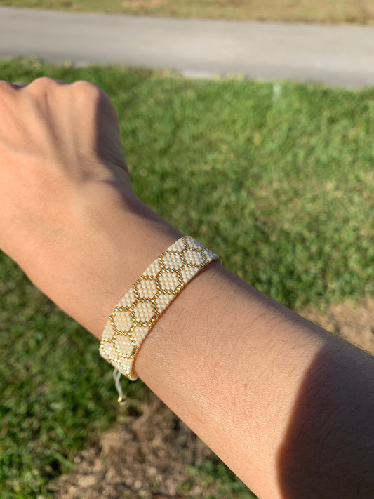 Elegant beige and gold bracelet